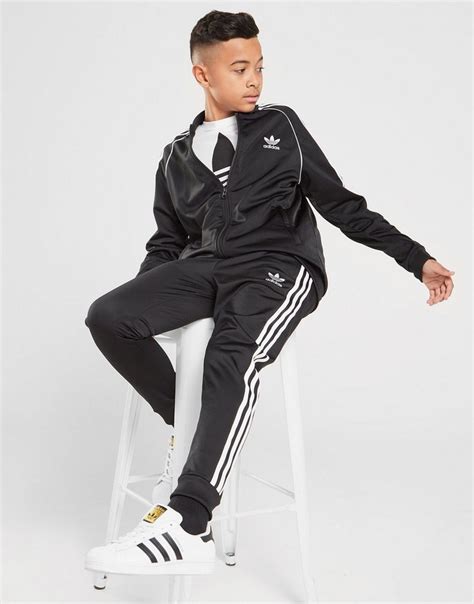 cheap mens adidas tracksuits uk|Adidas sst full tracksuit men's.